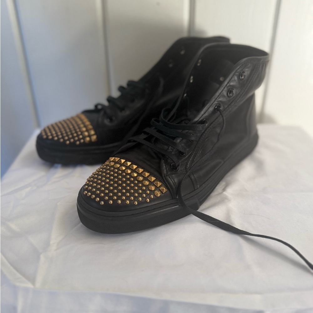 Gucci Black Leather Sneakers with Gold Accents